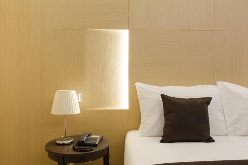 Katil atau katil-katil dalam bilik di Domus Terenzio Guesthouse