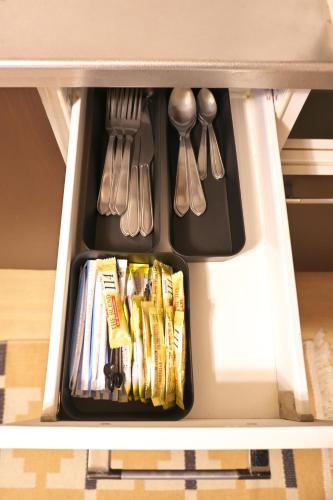 a drawer in a kitchen with utensils and utensils at ZenAbode303 羽田空港電車8分 都心エリア電車12分 in Tokyo