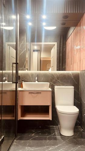 Ένα μπάνιο στο Prosecco Apartaments - Śródmieście Rzeszów