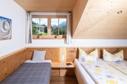 Кровать или кровати в номере Pongitzerhof