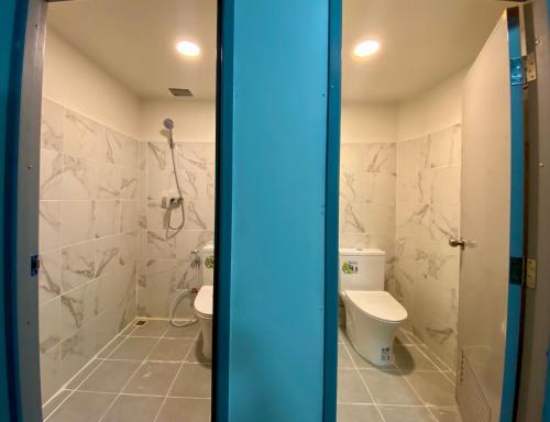 Koupelna v ubytování Orchard House Resort