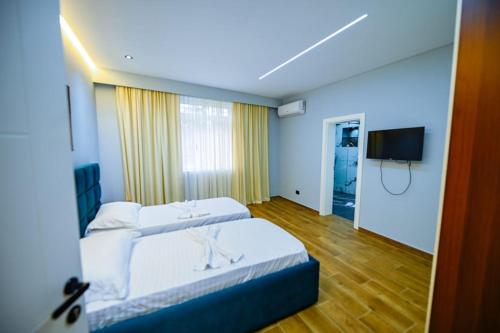 Postel nebo postele na pokoji v ubytování Mon Ami Boutique Hotel