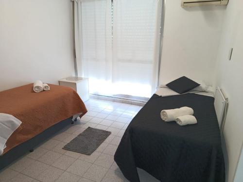 Postel nebo postele na pokoji v ubytování La Recova de La Boca