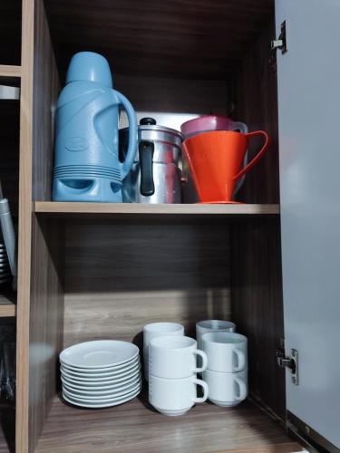 Casa de praia completa, com ar condicionadoにあるコーヒーまたはお茶