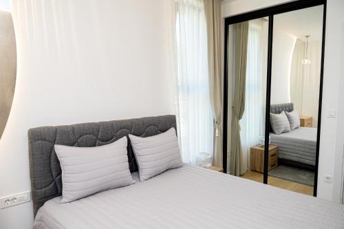 Una cama o camas en una habitación de Vila Konatar