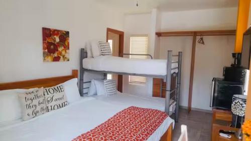 Postel nebo postele na pokoji v ubytování Las Palmas Beach villa 0230