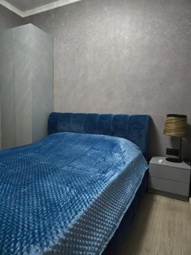 Ένα ή περισσότερα κρεβάτια σε δωμάτιο στο Garden Terrace Kvareli