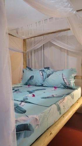 Postel nebo postele na pokoji v ubytování Naraha Beach House