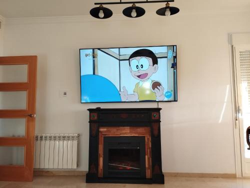 TV a/nebo společenská místnost v ubytování Mirasierra