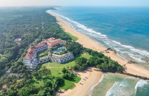 an aerial view of a resort on the beach at Taj Bentota Resort & Spa in Bentota