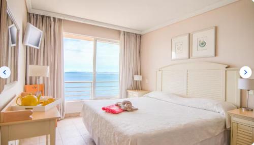 Postel nebo postele na pokoji v ubytování Departamento Hippocampus Resort & Spa Con Cón