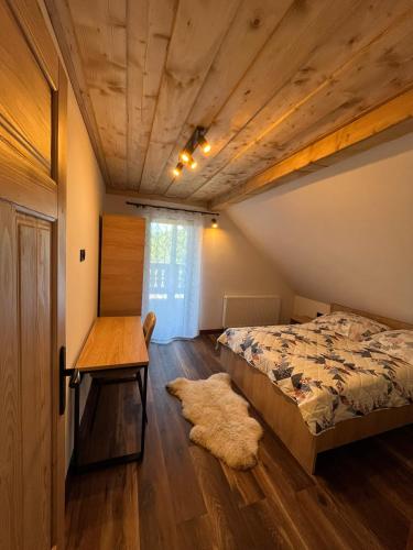 Una cama o camas en una habitación de Julia Vendeghaz Fony