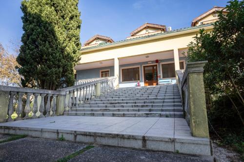 a building with stairs in front of it at Hotel Il Lato Azzurro - Isola di Sant'Erasmo - NO VEHICLES ACCESS in Venice