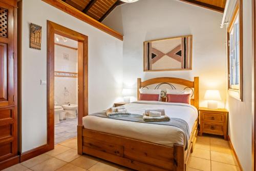 Katil atau katil-katil dalam bilik di Ocean View Eiras Cottage I