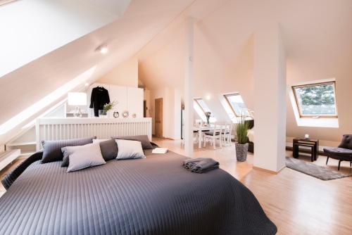 Ένα ή περισσότερα κρεβάτια σε δωμάτιο στο Parkside Apartment House
