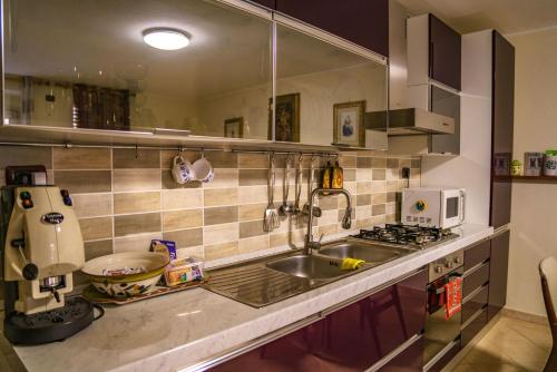 Kuchyňa alebo kuchynka v ubytovaní Moderne Déco
