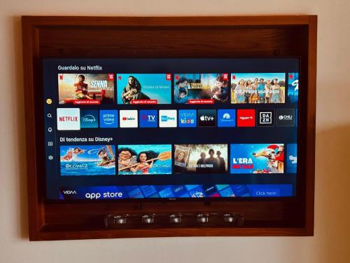a television screen with many movies on it at Antagnod 10 in Antagnod
