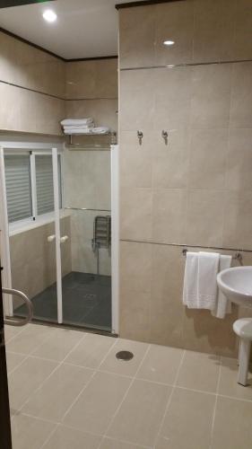 Koupelna v ubytování Hotel León