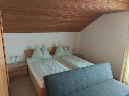 Postel nebo postele na pokoji v ubytování Maierlhof