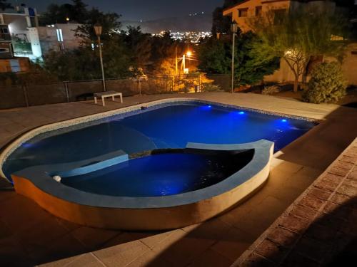 Πισίνα στο ή κοντά στο Hermosa casa de veraneo con pileta