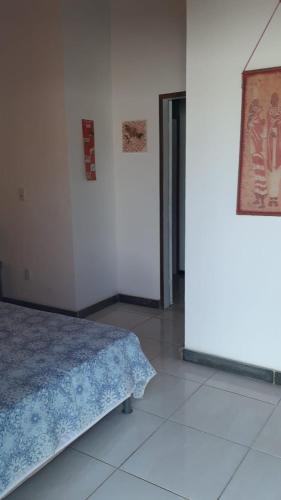 Кровать или кровати в номере Casa Nova Barra de jacuipe