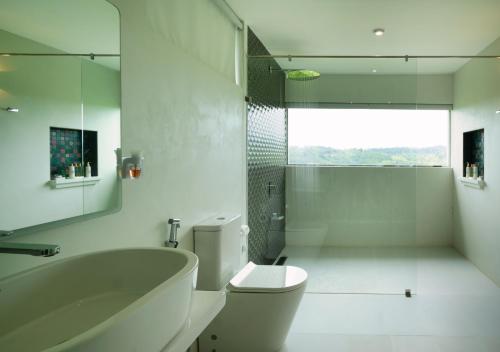 Ένα μπάνιο στο Camellia Ranch Villa Galle