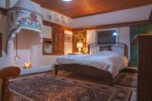 Ένα ή περισσότερα κρεβάτια σε δωμάτιο στο Secret garden Guest house Pozar Aridea