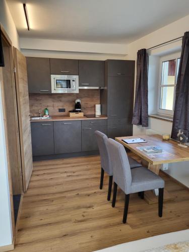 Kuchyňa alebo kuchynka v ubytovaní Apartments Brunnmeisterhof