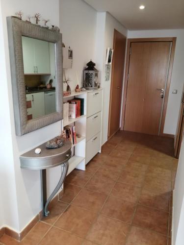 a bathroom with a sink and a mirror at Lomas del mar V in Vera