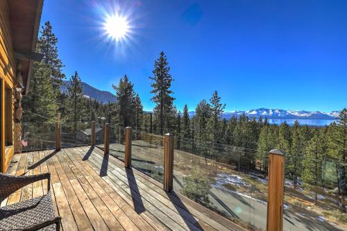a deck with a view of the mountains at Tallac View in Stateline