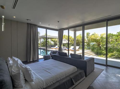 Ένα ή περισσότερα κρεβάτια σε δωμάτιο στο Lion Villa Phuket