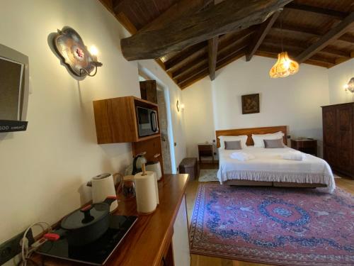 Ένα ή περισσότερα κρεβάτια σε δωμάτιο στο Quinta do Bravio