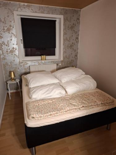 Postel nebo postele na pokoji v ubytování oasen