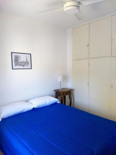 Ένα ή περισσότερα κρεβάτια σε δωμάτιο στο Departamento Pinamar 2 ambientes