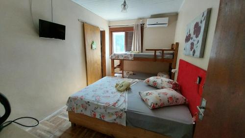 Postel nebo postele na pokoji v ubytování Pousada Leher