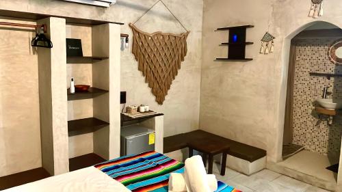 Postel nebo postele na pokoji v ubytování Pacha Tulum Boutique Hotel
