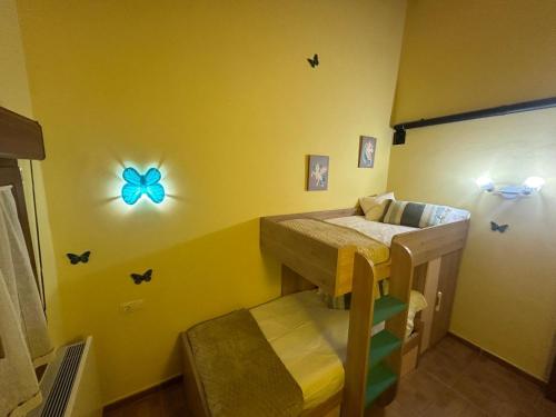 Katil atau katil-katil dalam bilik di El Collau - Apartamentos Rurales