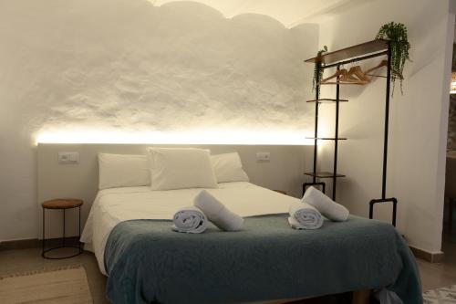 Ένα ή περισσότερα κρεβάτια σε δωμάτιο στο Old Side Girona Two