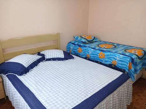 Cama ou camas em um quarto em Memórias de vó