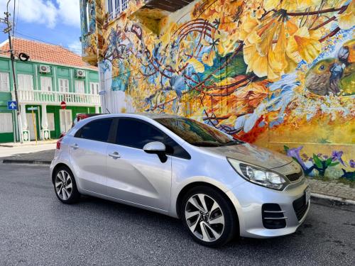a white car parked in front of a mural at 'Blue Vibe' Charming 1-bedroom apartment with exotic Bali Natural Bathtub in Grote Berg