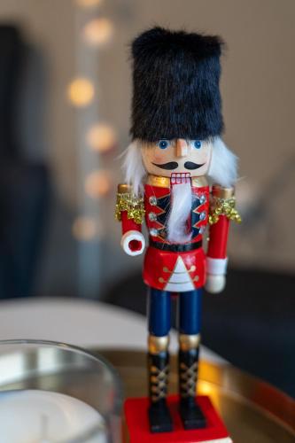 a figurine of a nutcracker on a table at Το σπίτι στο χωριό in Tríkala