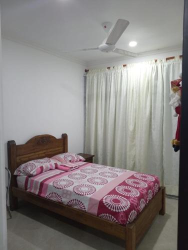 Letto o letti in una camera di Confortable casa vacacional en Carmen de Apicalá