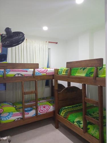 Letto o letti in una camera di Confortable casa vacacional en Carmen de Apicalá