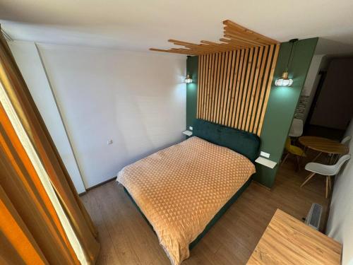 Bakuriani Mgzavrebi Block 9 Aparment 501にあるベッド