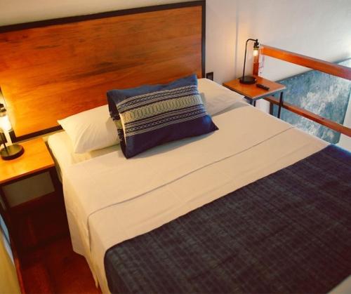 Postel nebo postele na pokoji v ubytování BKL Hotel Oaxaca