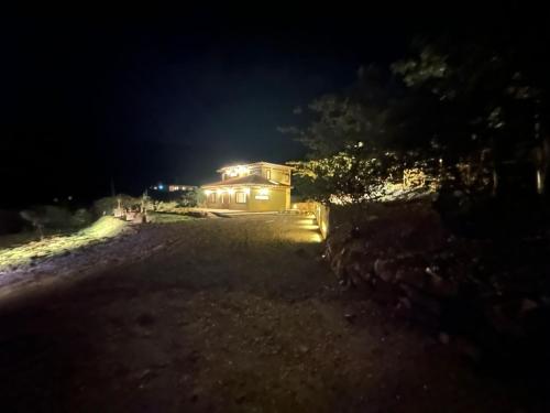 a house at night with lights on it at Hotel Sol de la Montaña Villa de leyva in Villa de Leyva