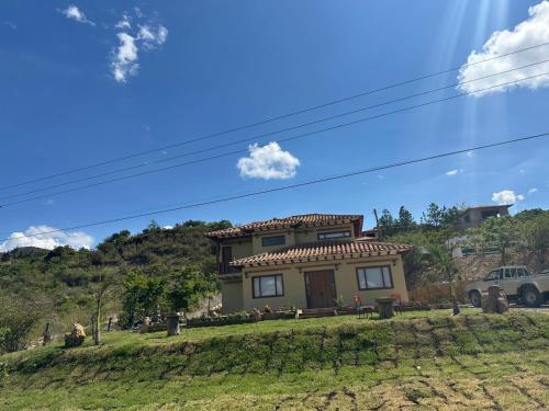 a house on the side of a hill at Hotel Sol de la Montaña Villa de leyva in Villa de Leyva