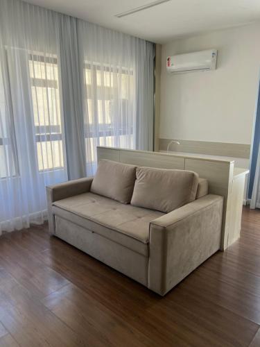 Ein Sitzbereich in der Unterkunft Flat exclusivo vista mar