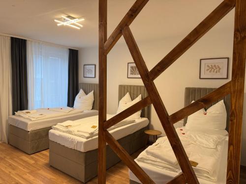 Postel nebo postele na pokoji v ubytování Between IV