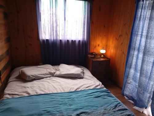 Ένα ή περισσότερα κρεβάτια σε δωμάτιο στο Casa Prana